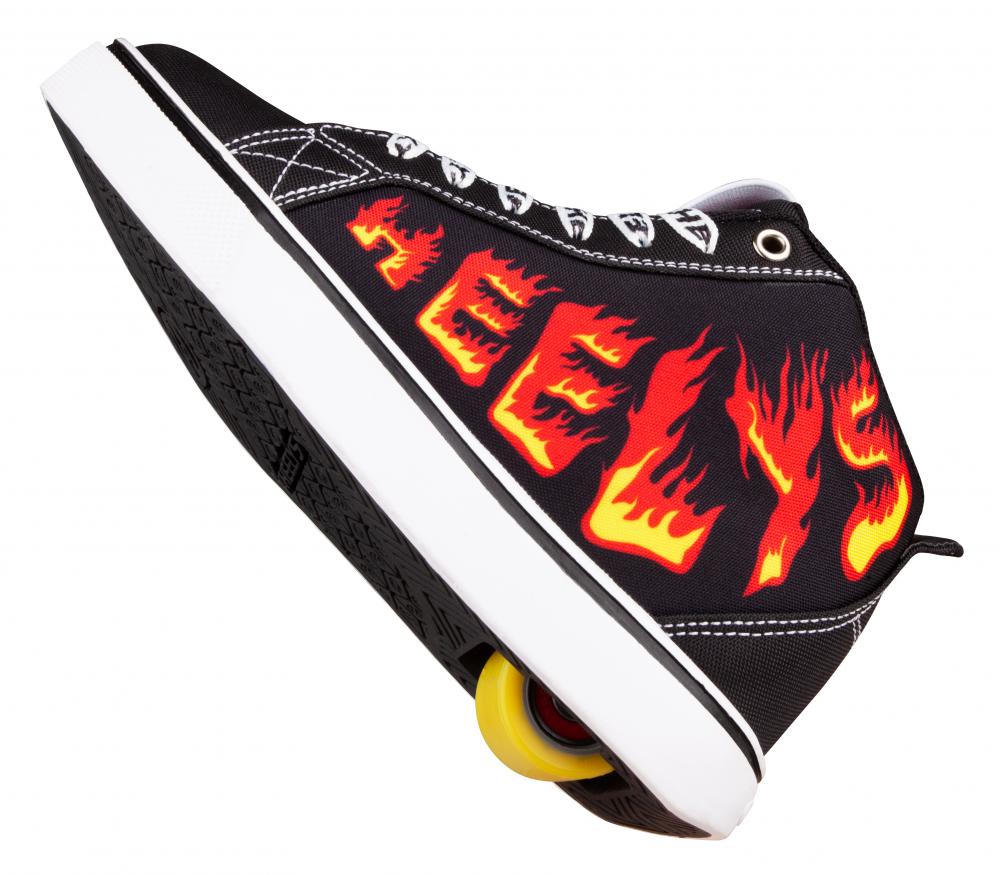 The Heelys Racer 20 Mid have yellow and red flames on the side of heelys. Oversized Heelys wordmark in flame print on side panel.